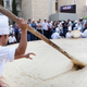 Photo of Lebanese chefs preparing 22,000 pounds of hummus via Hussein Malla/AP